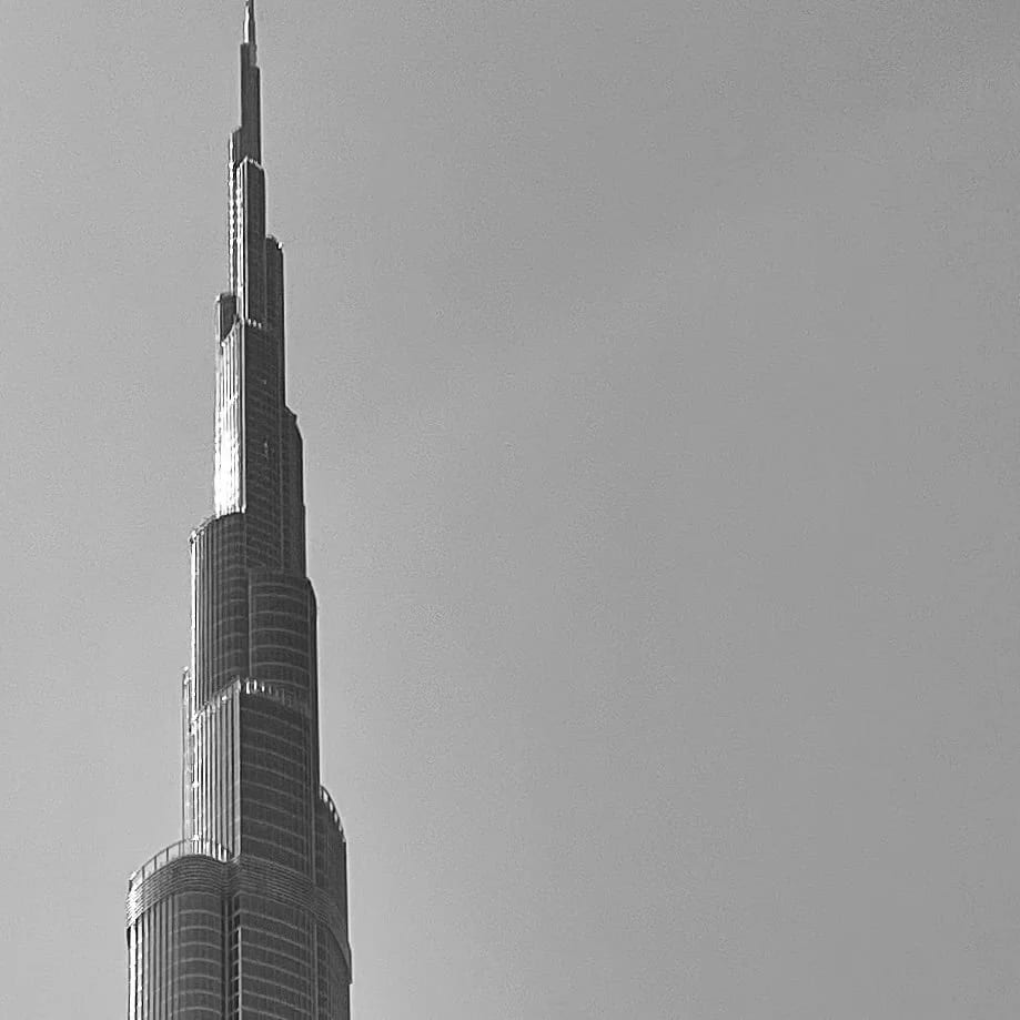 The Burj Khalifa rising into low cloud